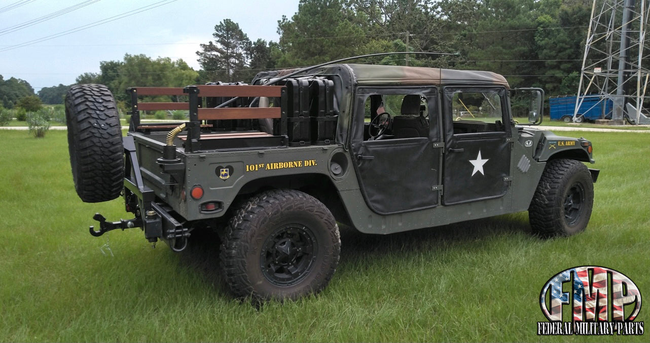 Swing away military Humvee tire carrier mounts on rear bumper – Federal ...