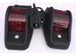 Deux éclairages latéraux Lumières Lentilles rouges Black Corps L.E.D.