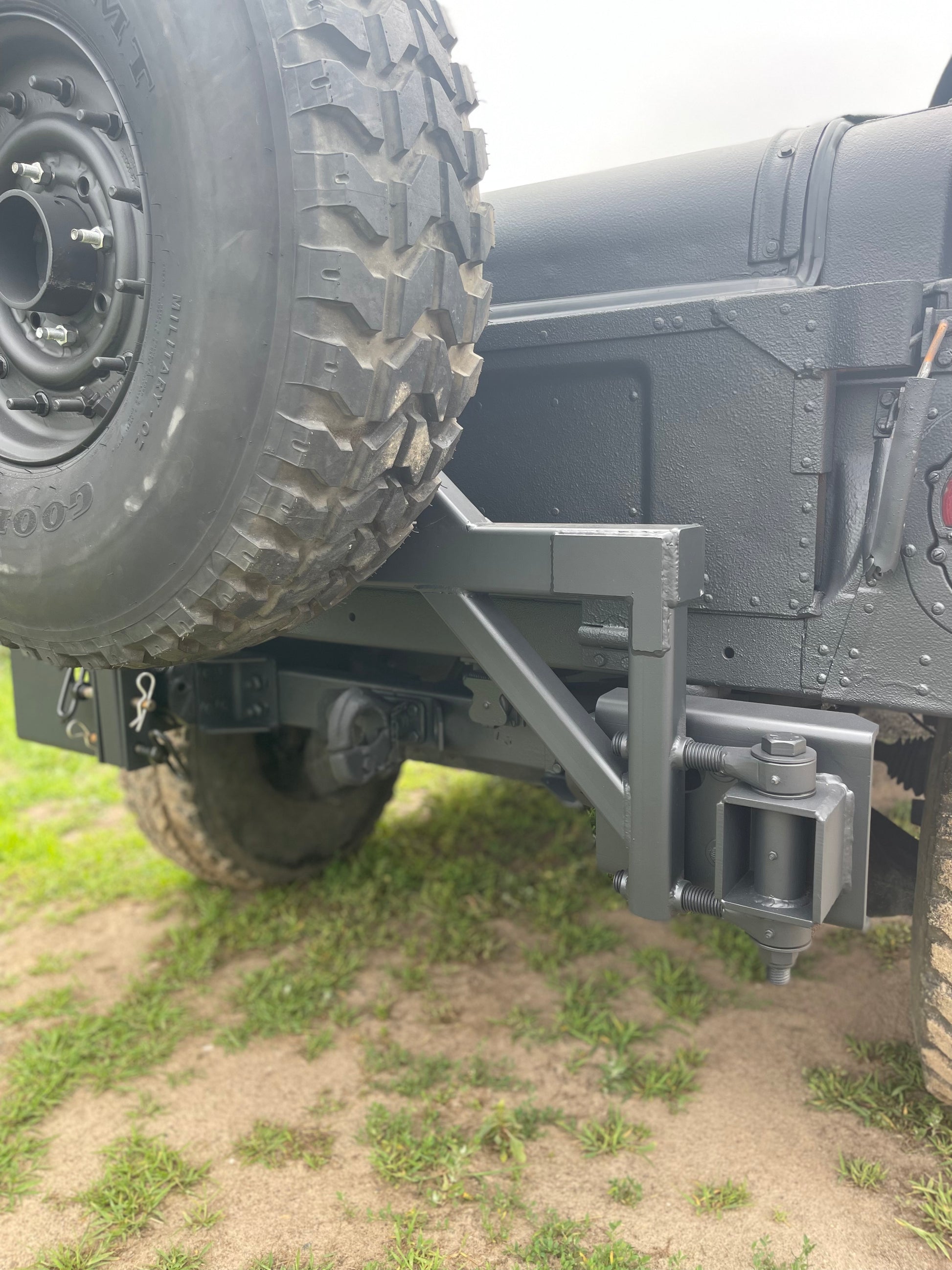 Swing away military Humvee tire carrier mounts on rear bumper – Federal ...