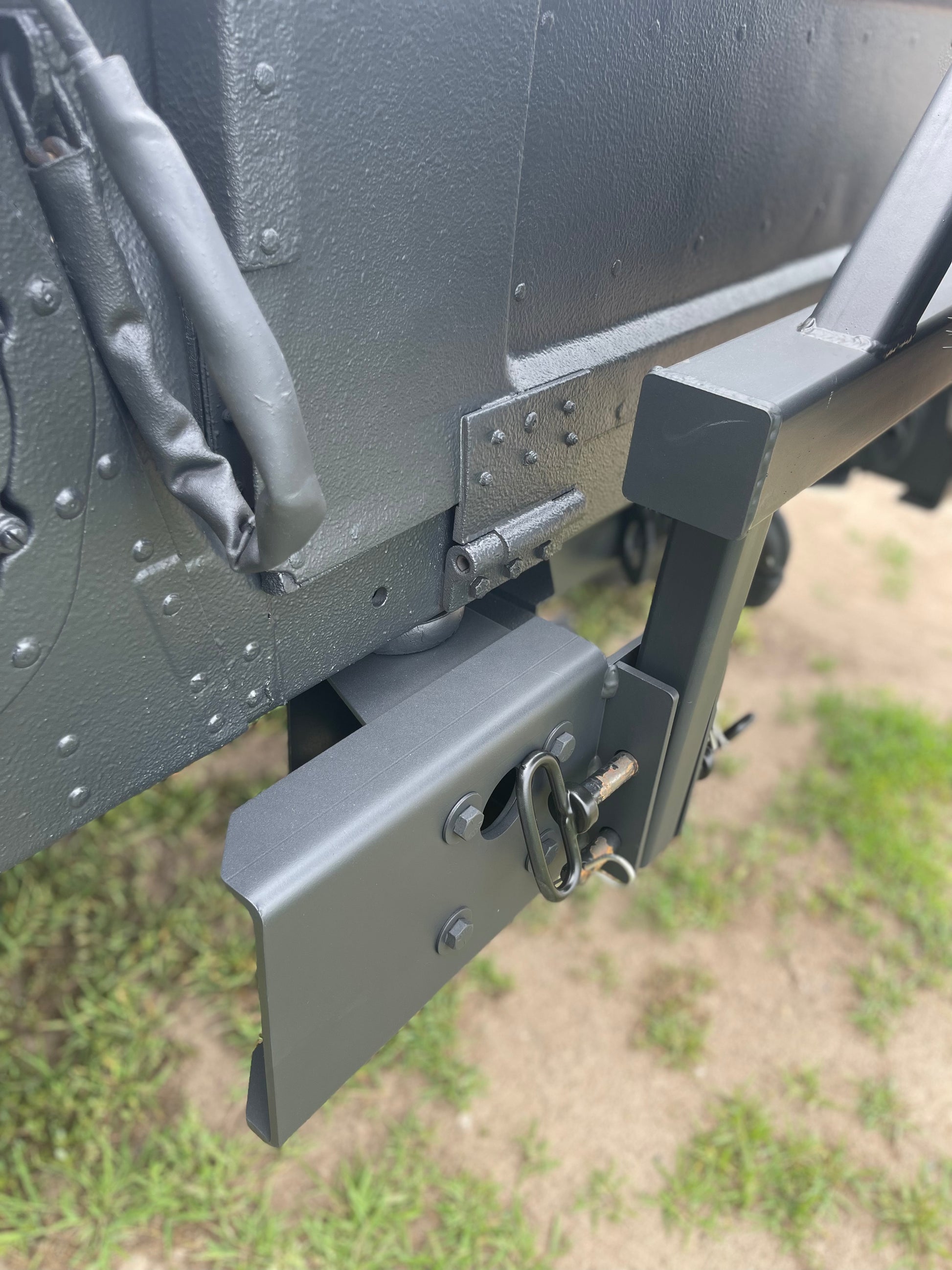 Swing away military Humvee tire carrier mounts on rear bumper – Federal ...