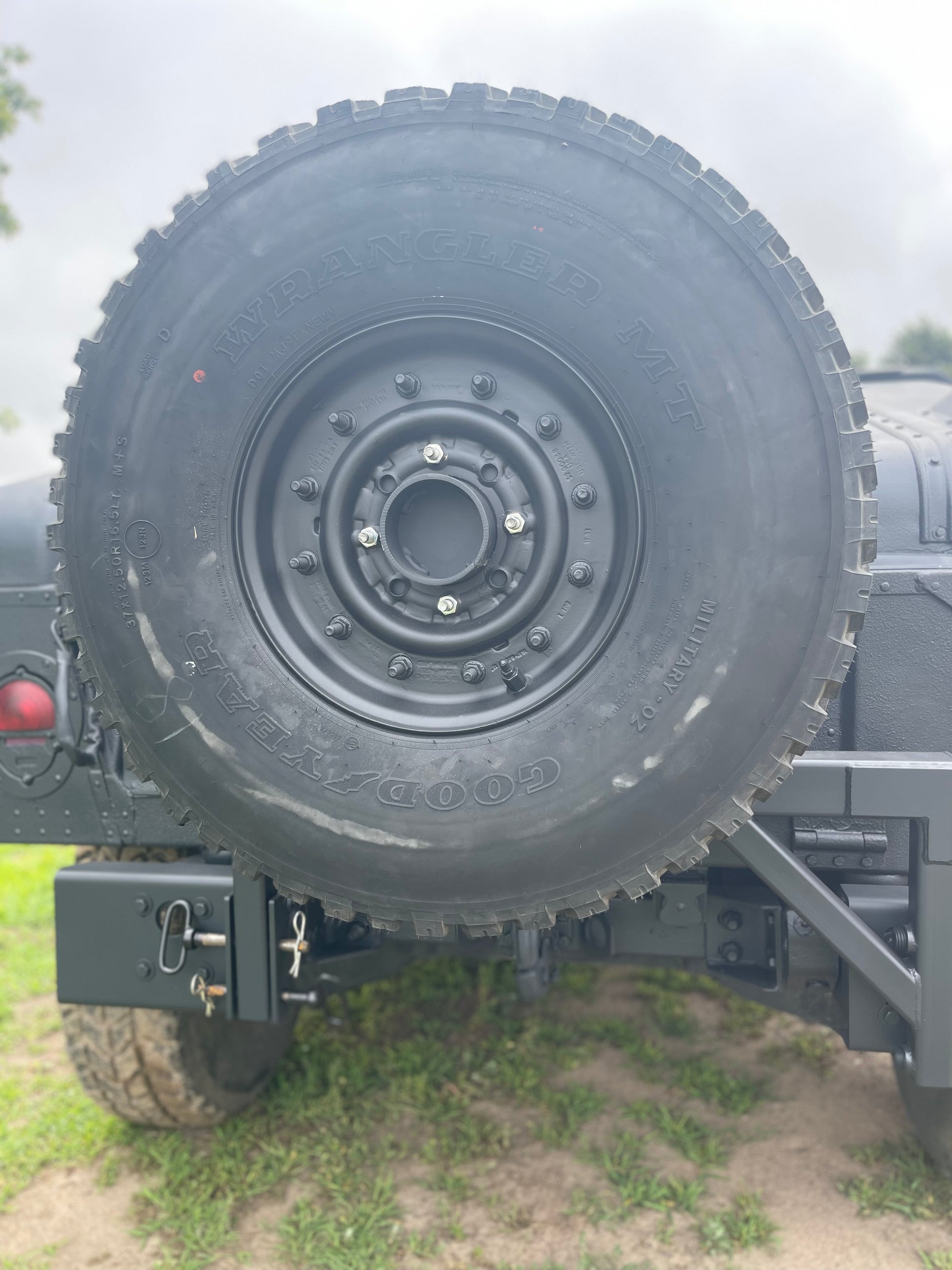 Swing away military Humvee tire carrier mounts on rear bumper – Federal ...