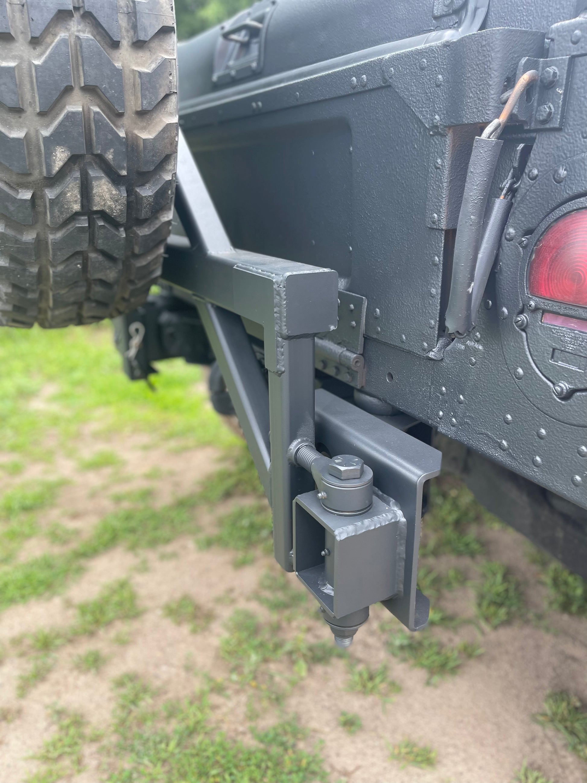 Swing away military Humvee tire carrier mounts on rear bumper – Federal ...