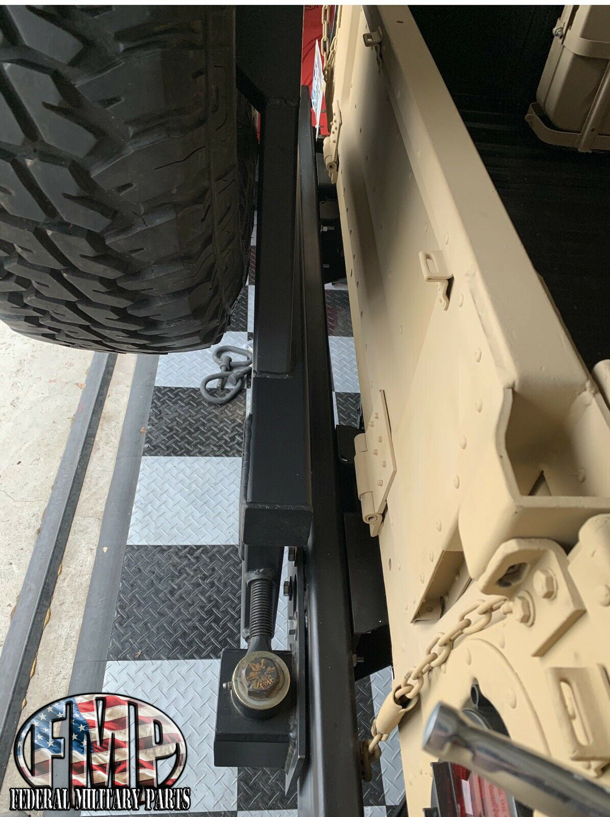 Swing away military Humvee tire carrier mounts on rear bumper – Federal ...